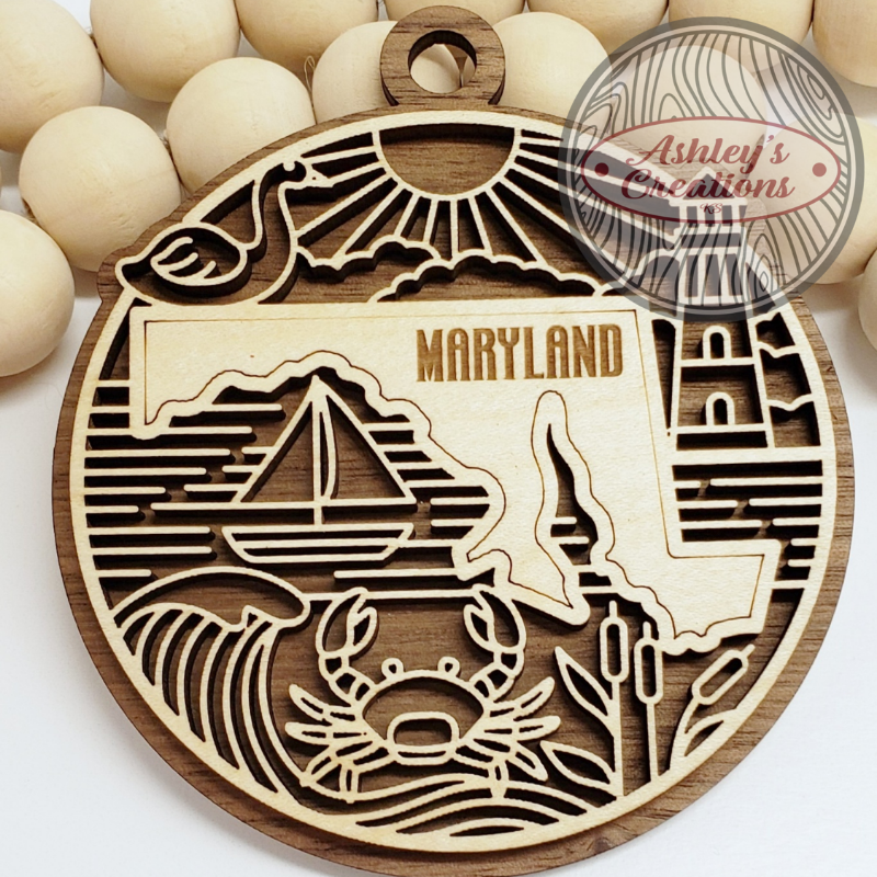 Wooden ornament with the state of Maryland in the middle.
