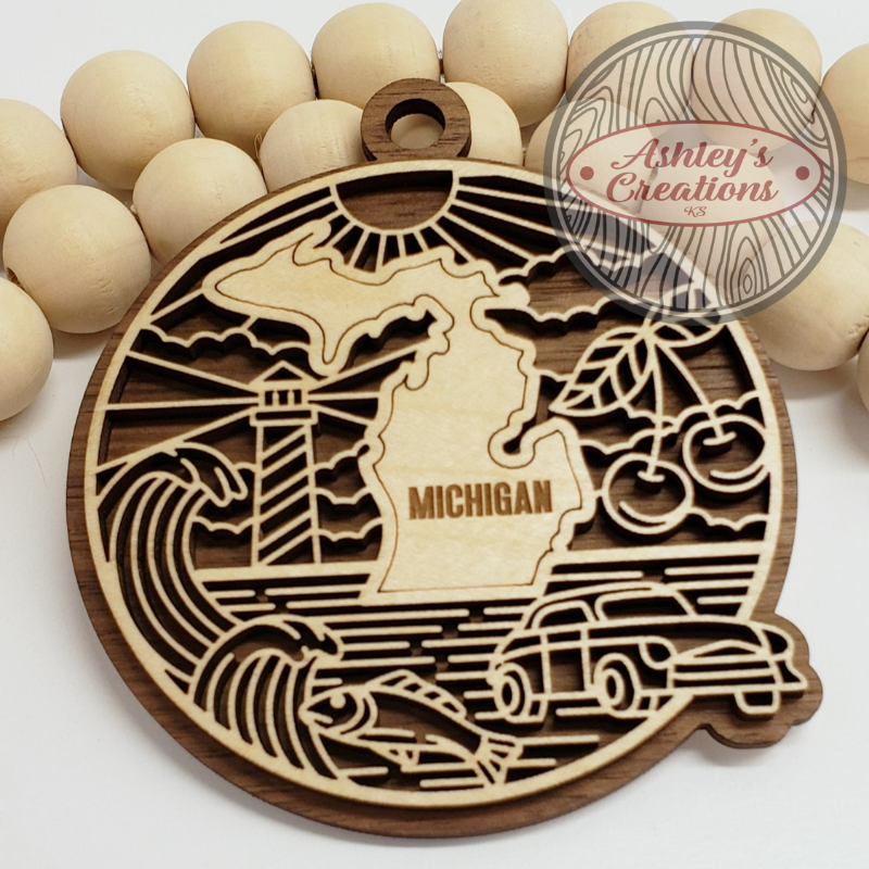 Wooden ornament with the state of Michigan in the middle.