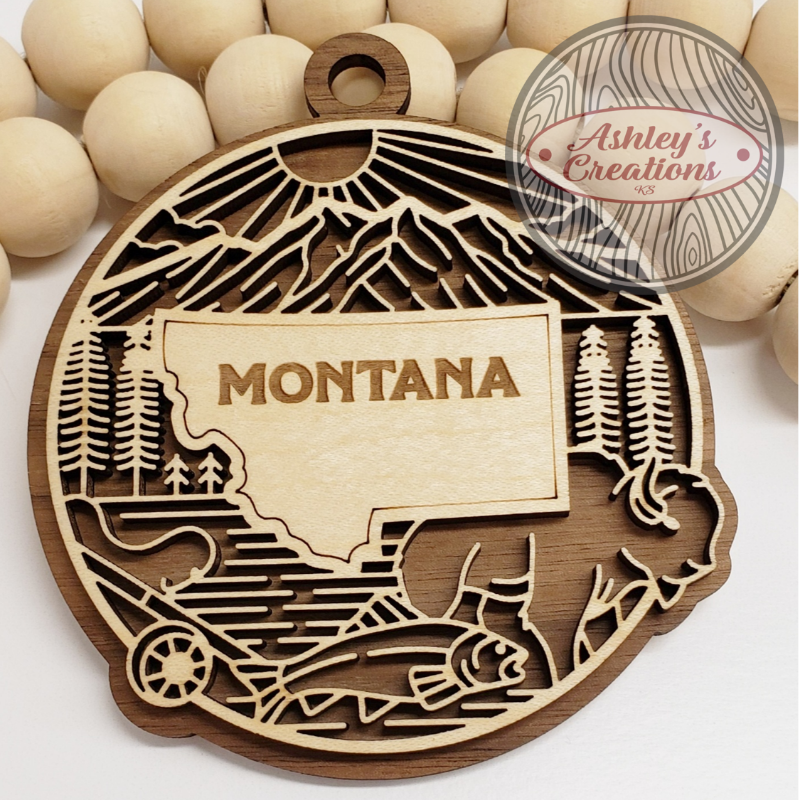 Wooden ornament with the state of Montana in the middle.